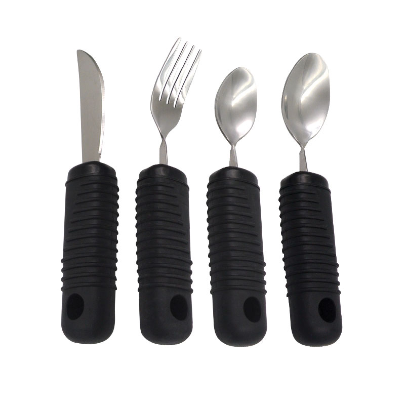 4 Couverts à manche grossi de couleur noir