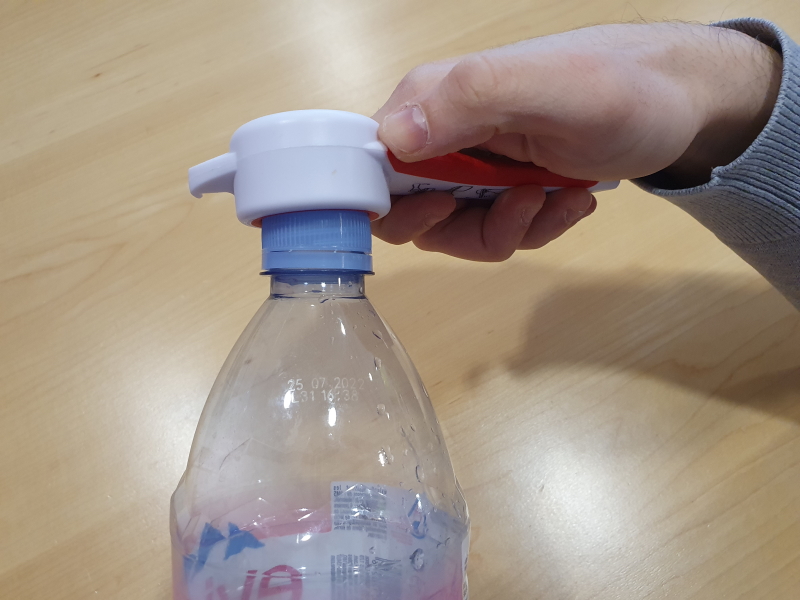 ouvre bouteille à poignée