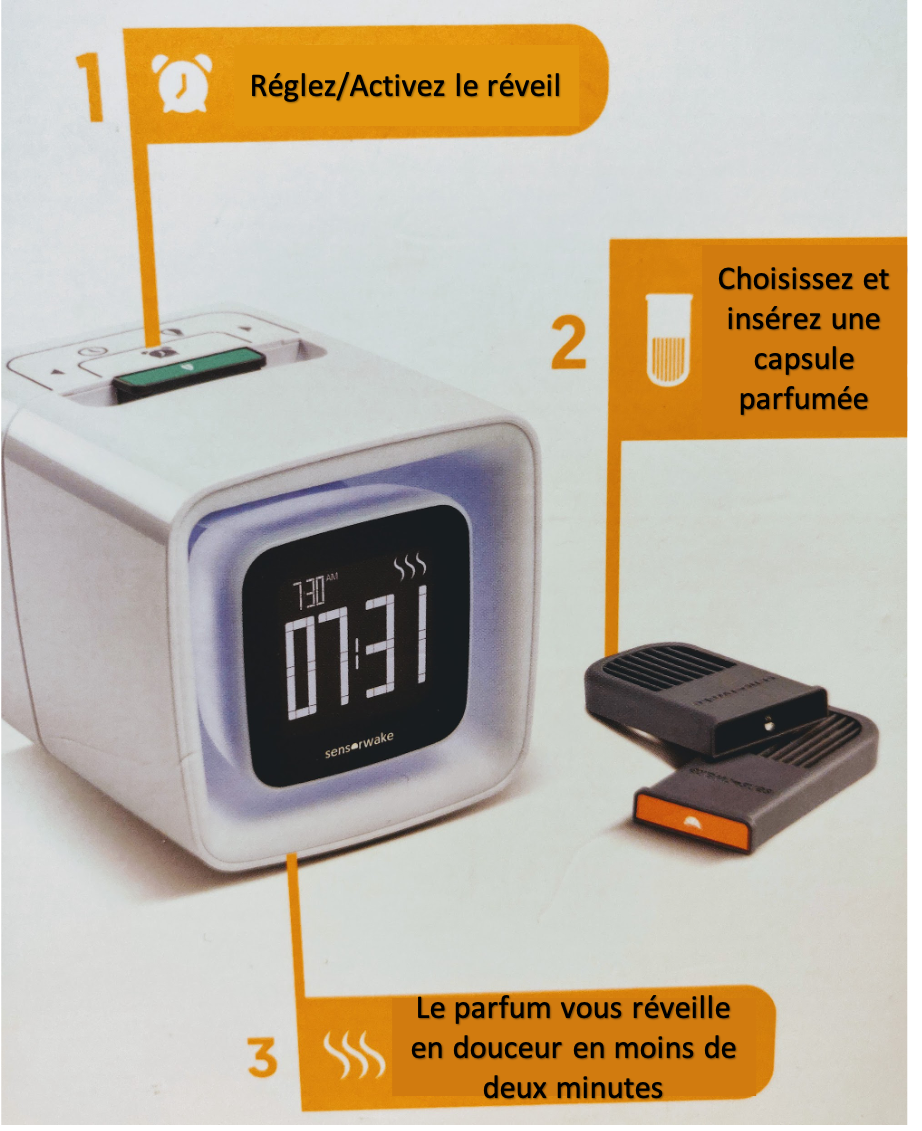 réveil en forme de cuge montrant la possibilité d'insérer des capsule parfumées dans le réveil, pour diffusion lors de l'alarme programmée