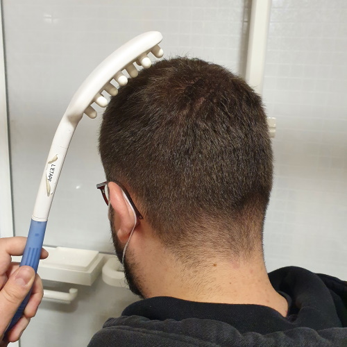 Brosse à long manche pour shampoing