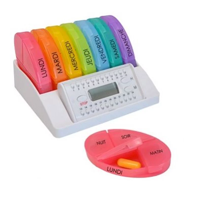 Socle équipé de commandes à boutons et écran pour 8 boitiers pour médicaments étiquettés chacun en français d'un jour de la semaine