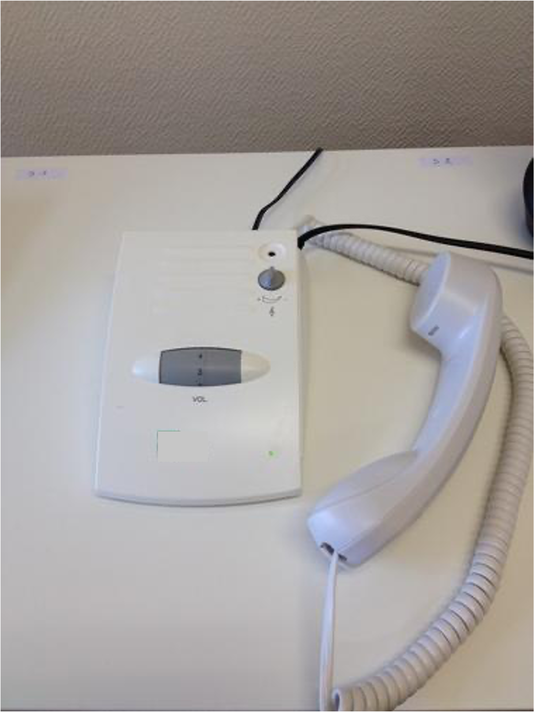 Boitier filaire de téléphone fixe équipé pour ajuster le volume